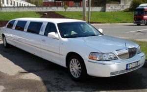 Front and side view of the white Town Car limousine in Madrid, Spain