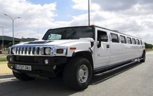 Front and side view of the white Hummer Limousine in Lviv, Ukraine